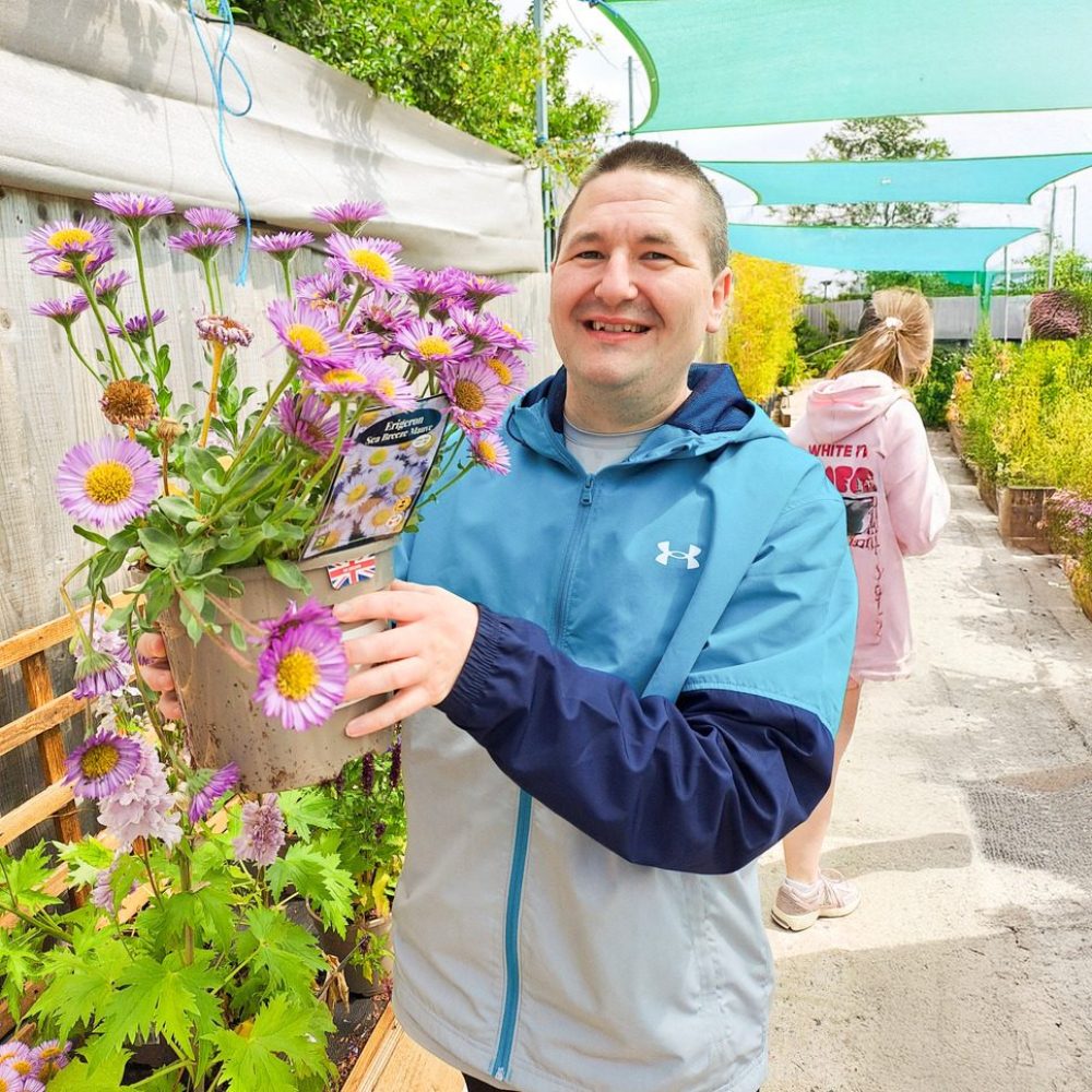 Carl-with-flowers