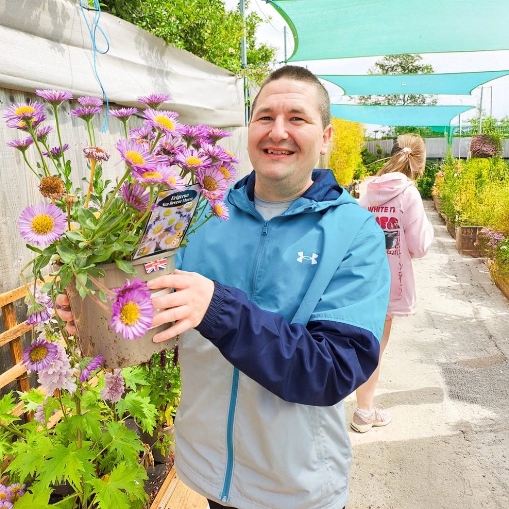 Carl-with-flowers
